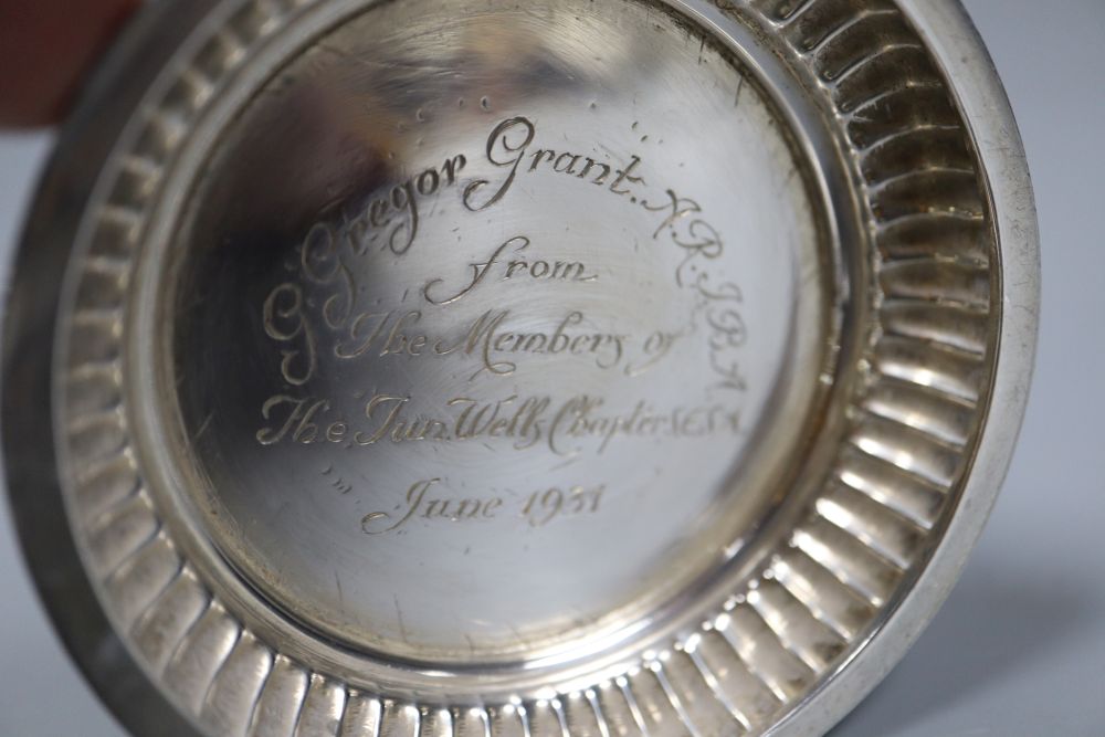 A silver sugar caster, William Comyns, London 1929 and a pair of silver presentation Tudor rose dishes, 1966, 16.5oz.